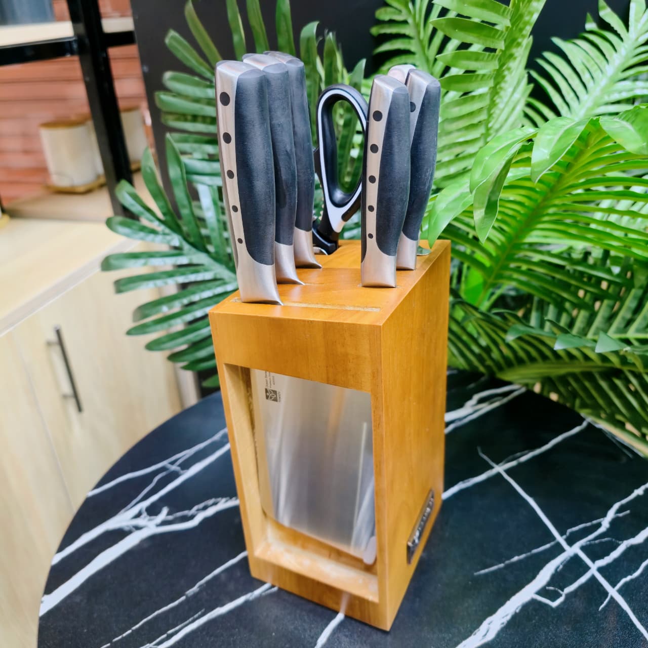 8pc Unique knife set with bamboo place on