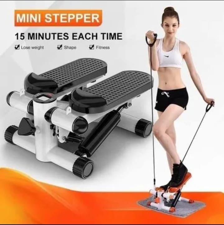 mini exercise stepper machine, a compact fitness device used for cardio workouts and toning muscles.