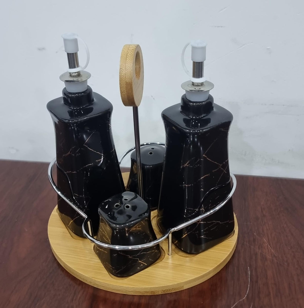 set of 4 ceramic gravy boat season oil dispenser and shakers on bamboo base
