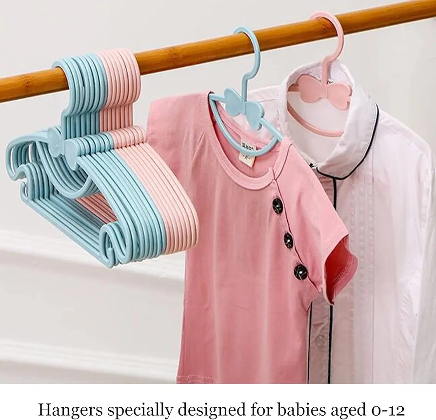 Pastel-colored plastic kids clothes hangers.