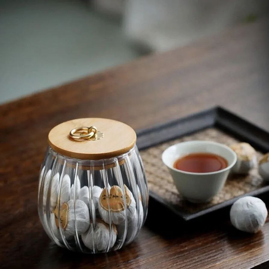 Ribbed glass storage jar