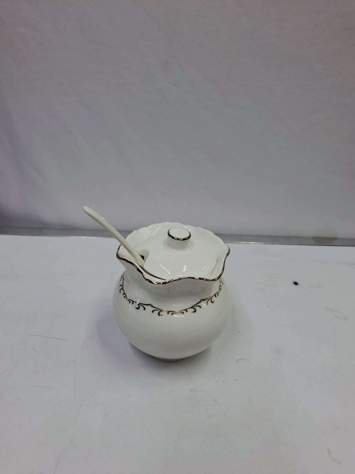 Classy sugar dish with gold rim
