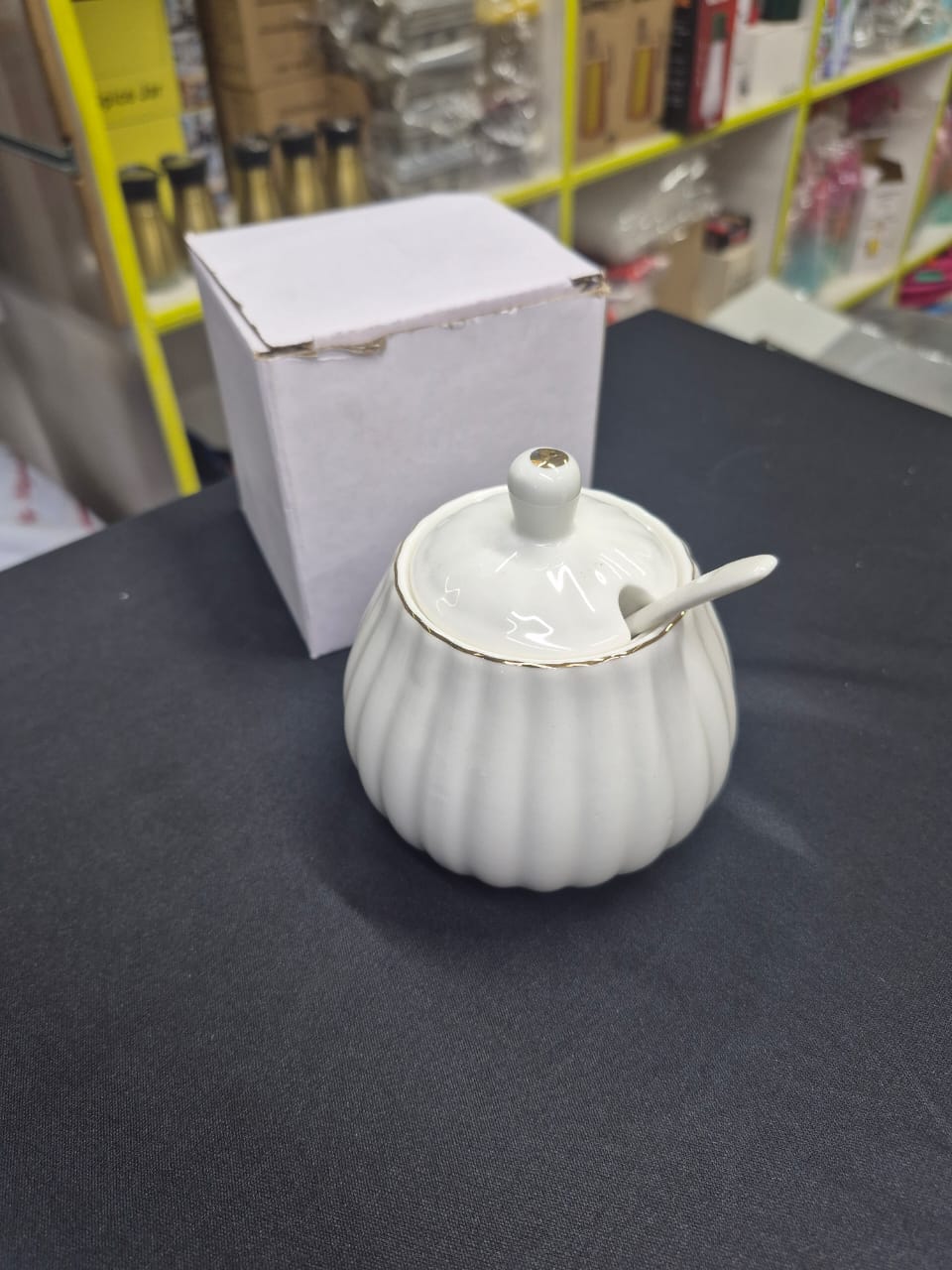 Gold rimmed sugar dish