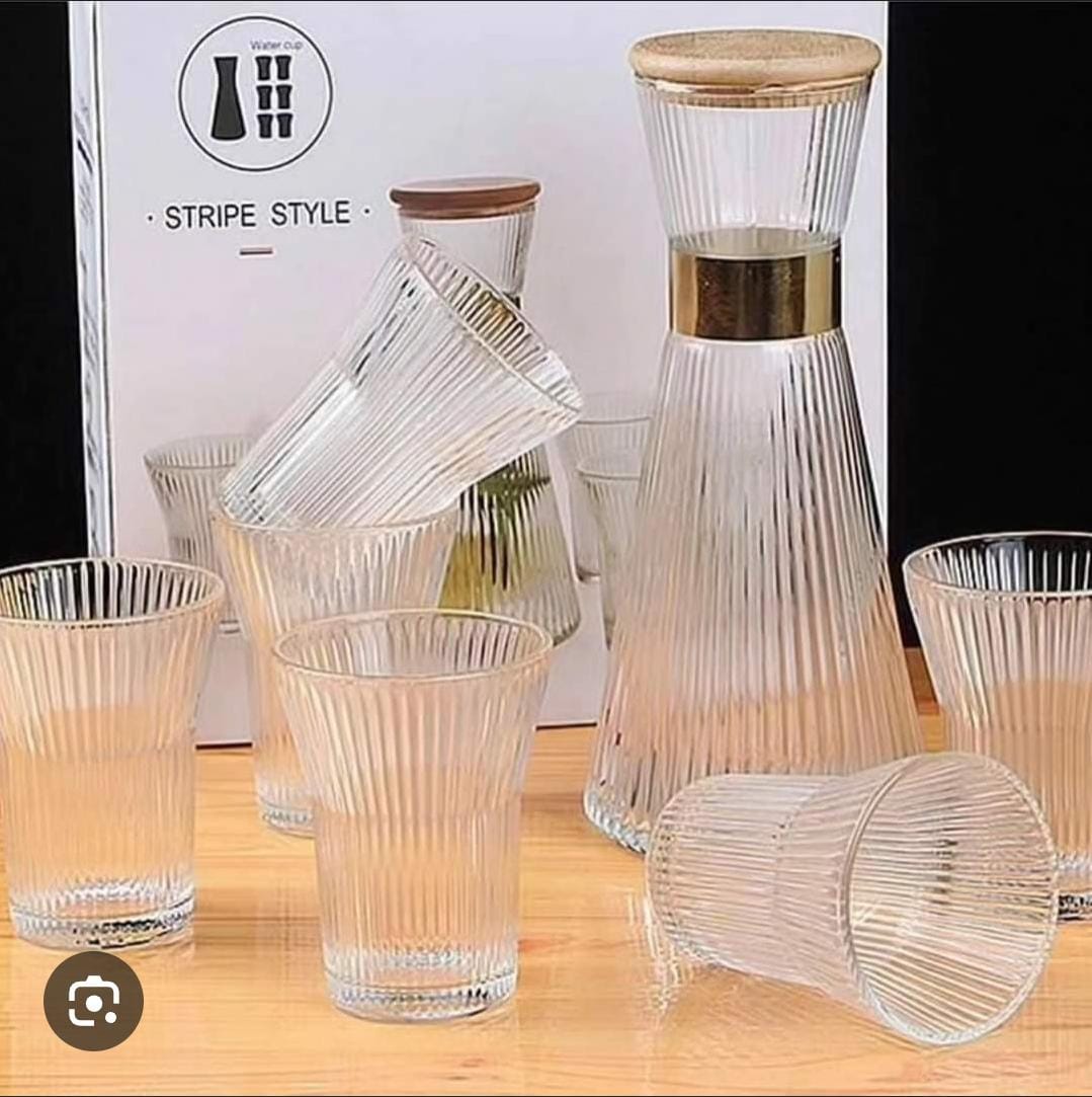 Glass carafe with glasses