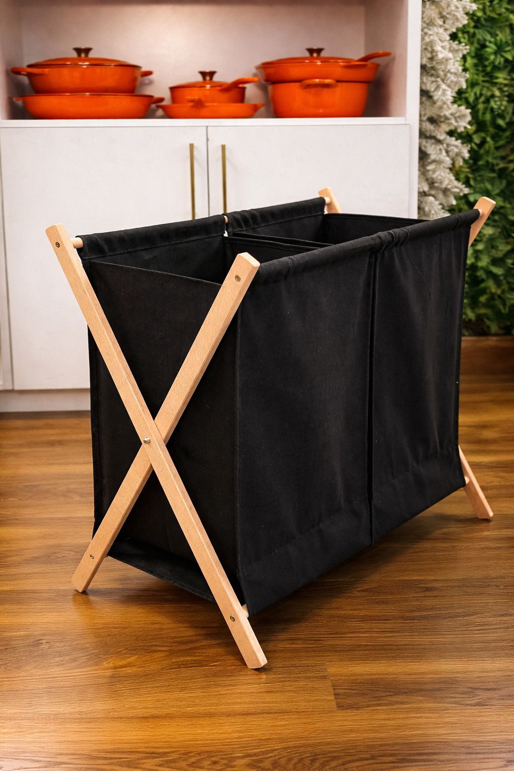 Foldable partitioned laundry basket