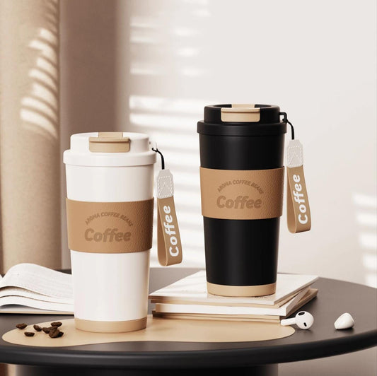 vacuum insulated 304 stainless steel Coffee mug with a leather sleeve and a straw.