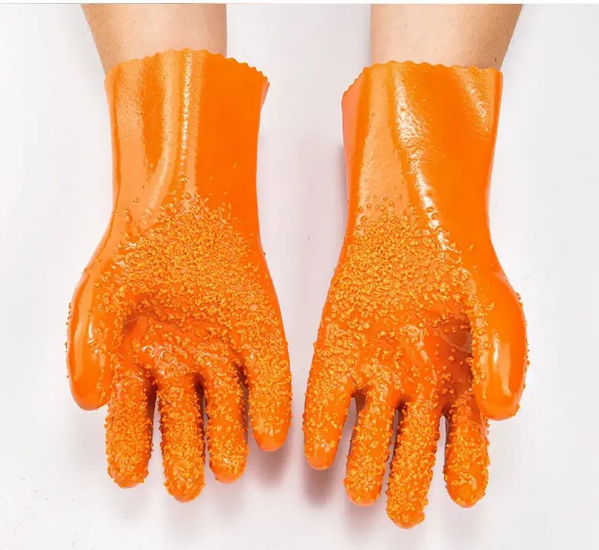 A pair of hard silicone latex studded gloves