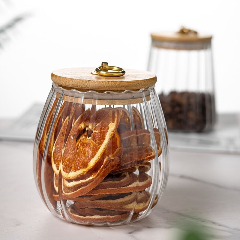 Ribbed glass storage jar