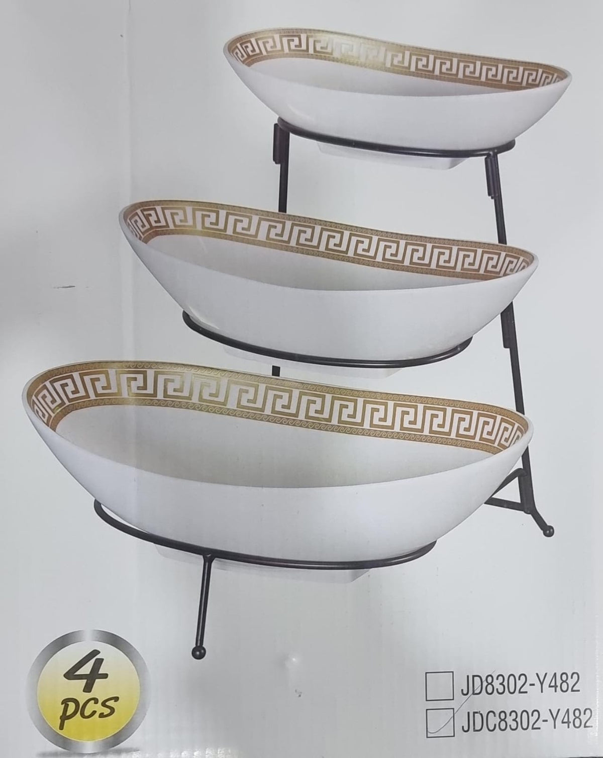 set of 3 ceramic fruit plates on black metal rack