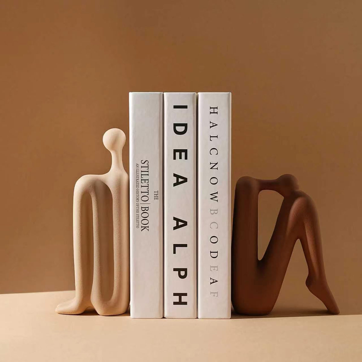 Modern minimalist back to back abstract figure ceramic bookends