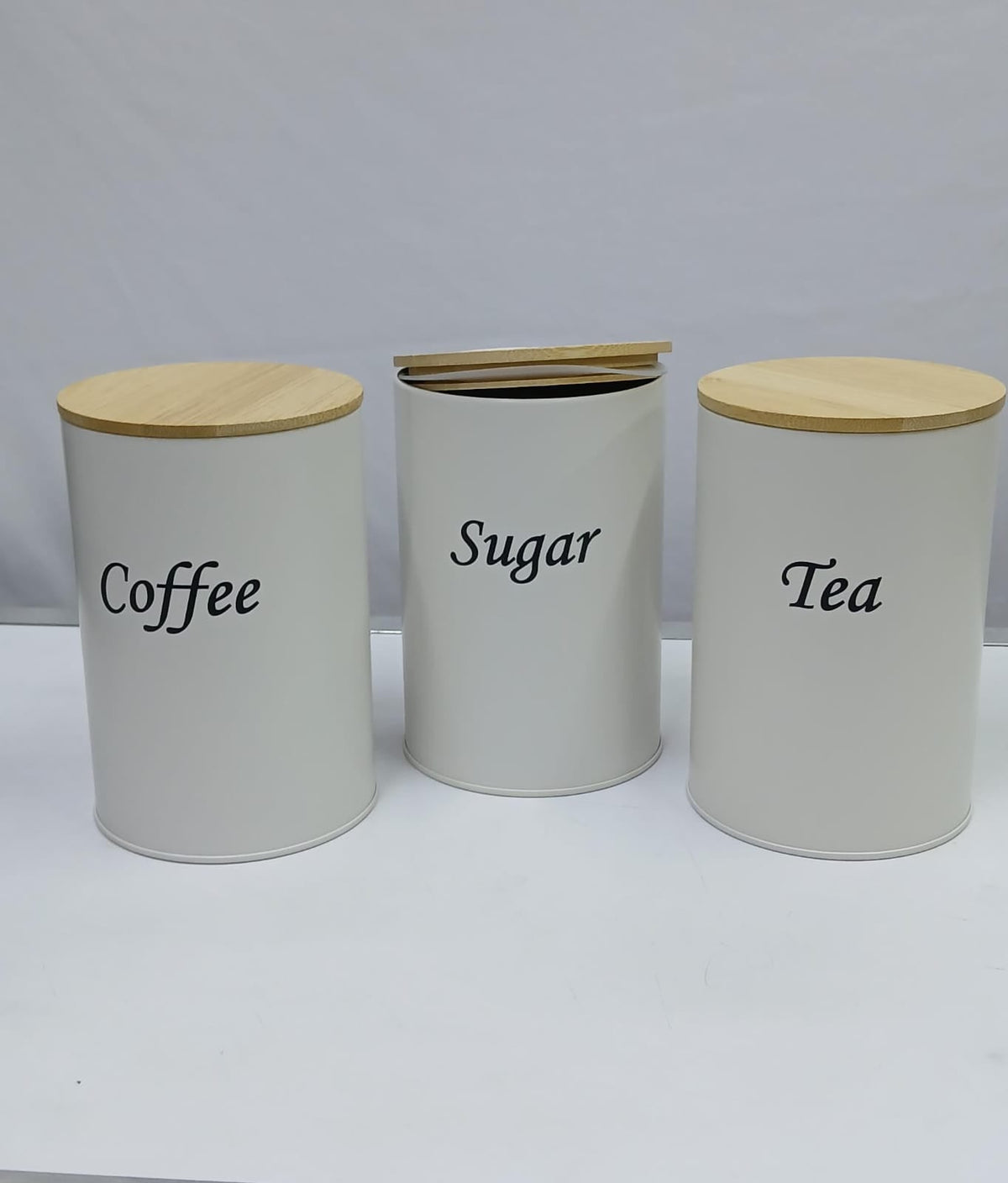Coffee, Sugar & Tea Alloyeyal canisters with a bamboo lid