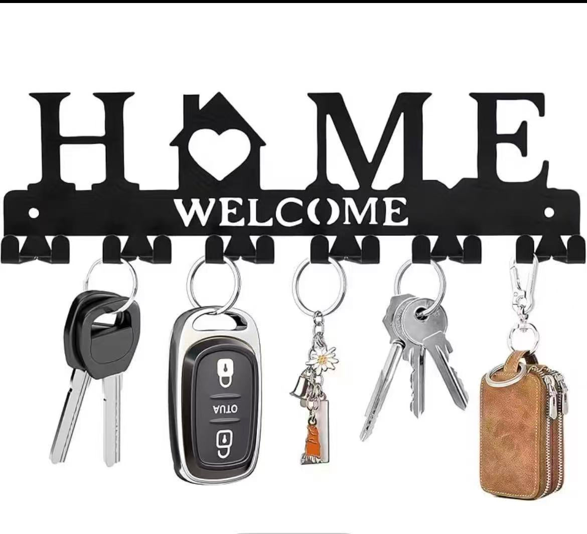 Black metal wall-mounted key holder