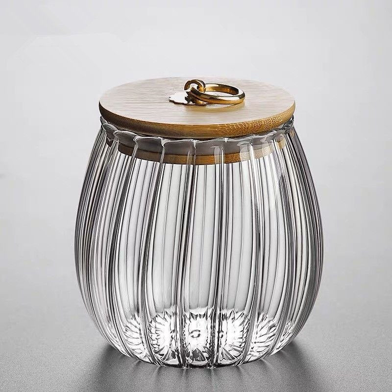 Ribbed glass storage jar