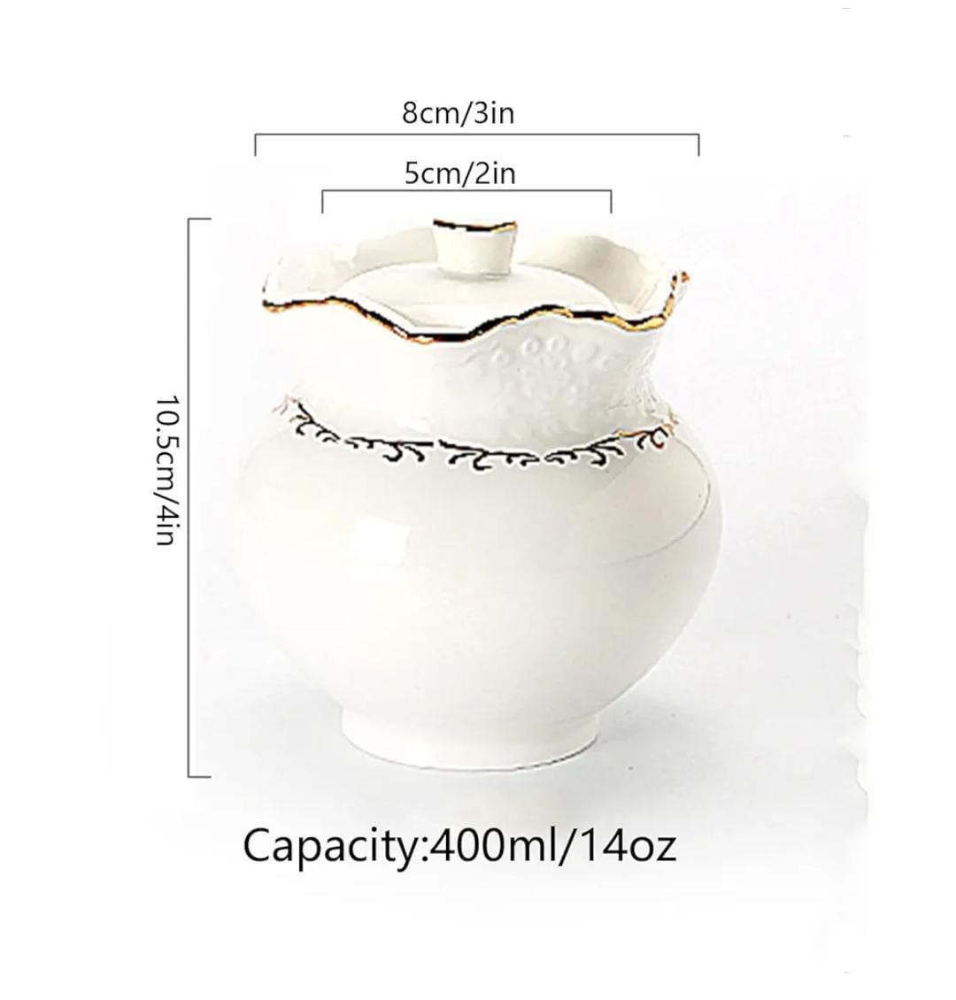 Gold rimmed sugar dish