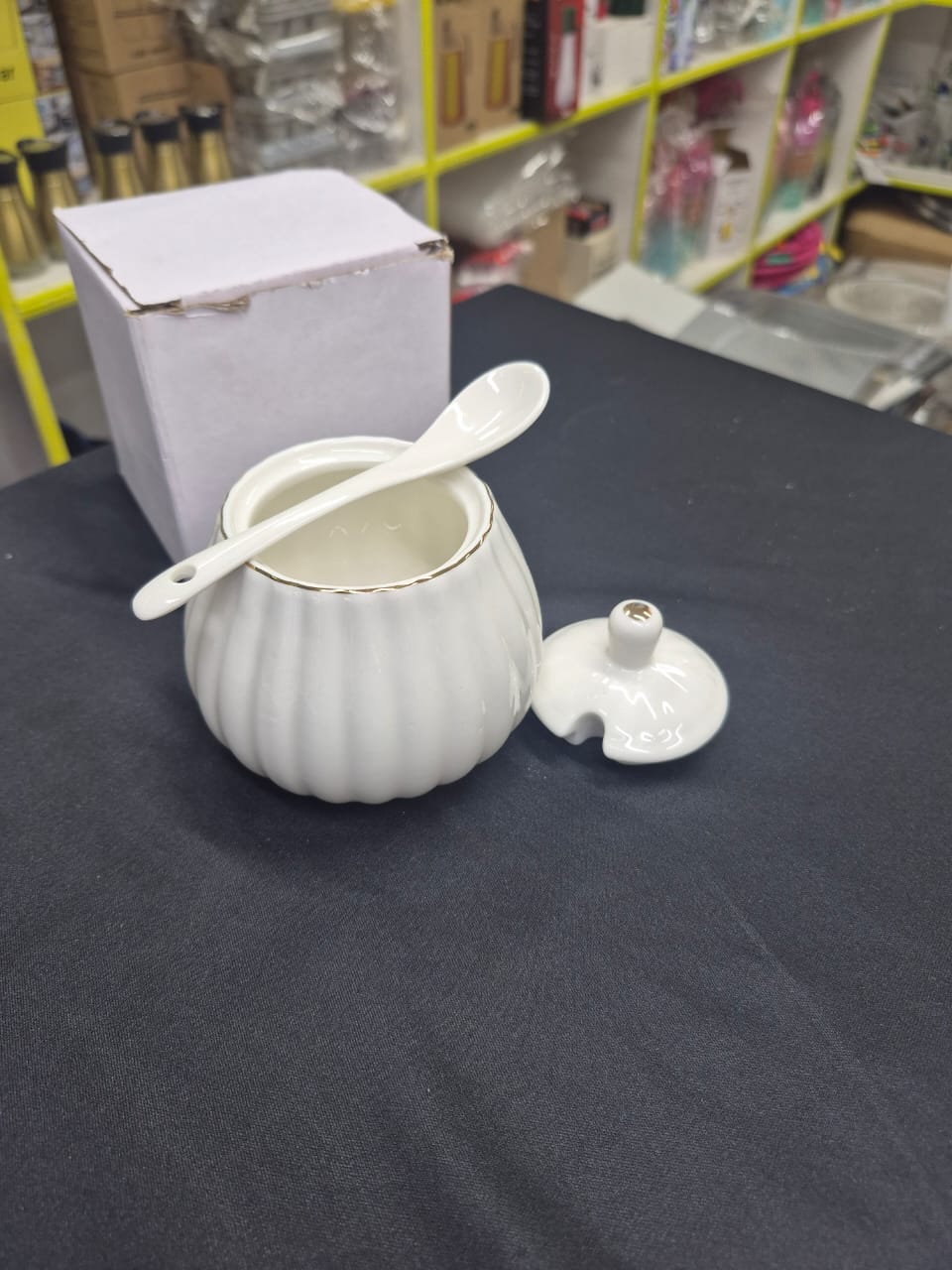Gold rimmed sugar dish