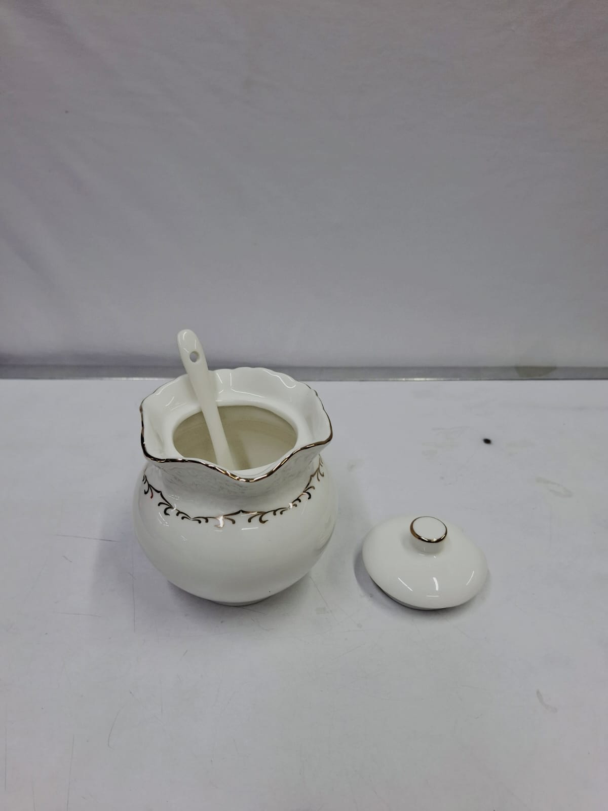 Classy sugar dish with gold rim