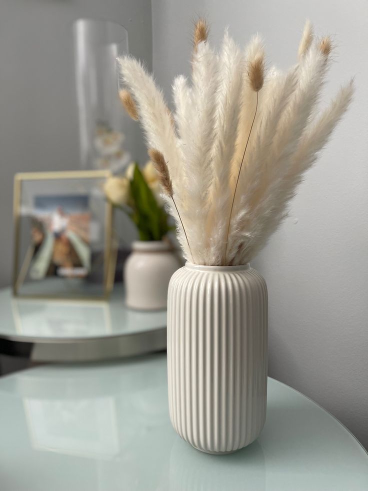 Sleek heavy ribbed modern elegant vase with a glossy finishing