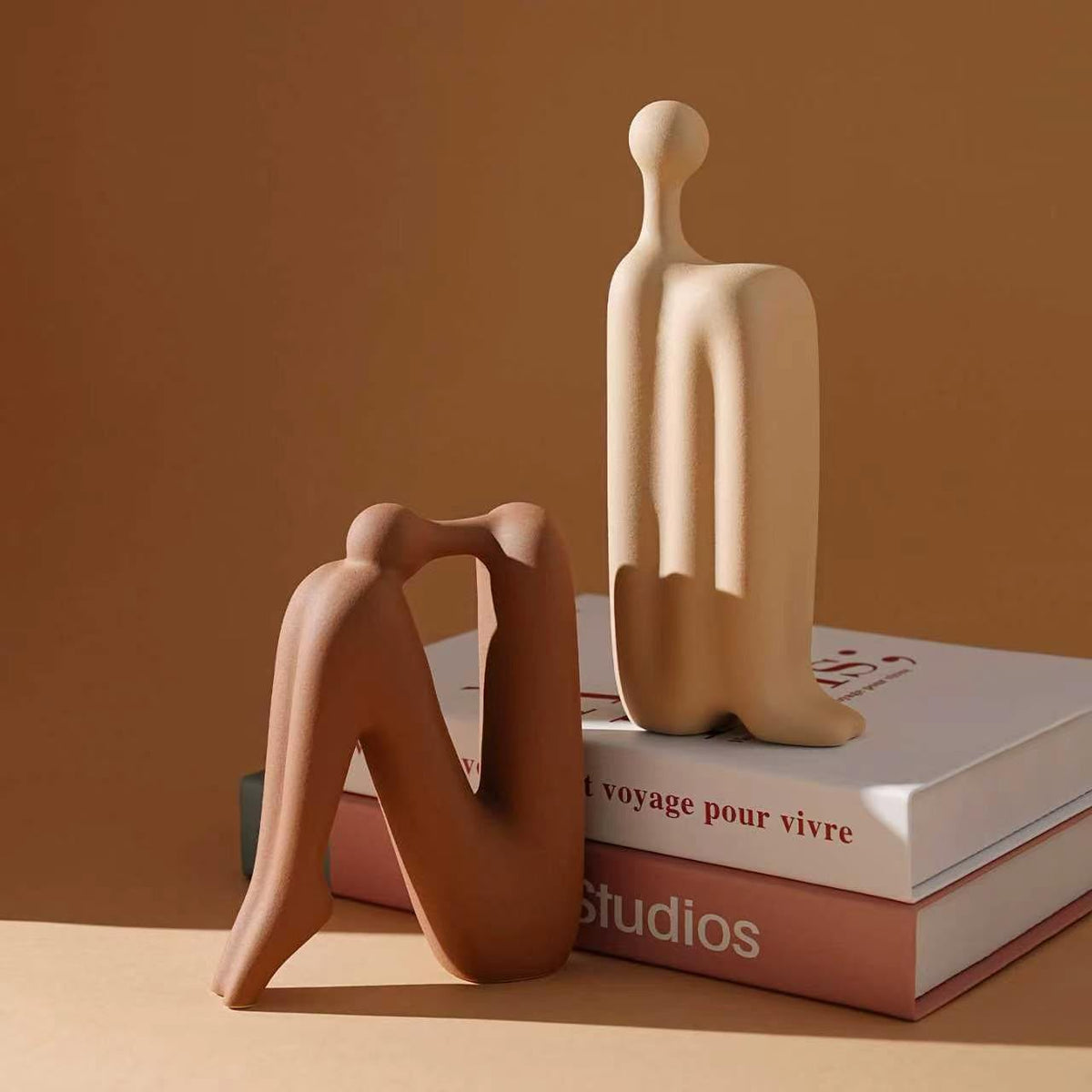 Modern minimalist back to back abstract figure ceramic bookends