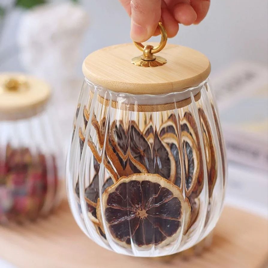 Ribbed glass storage jar